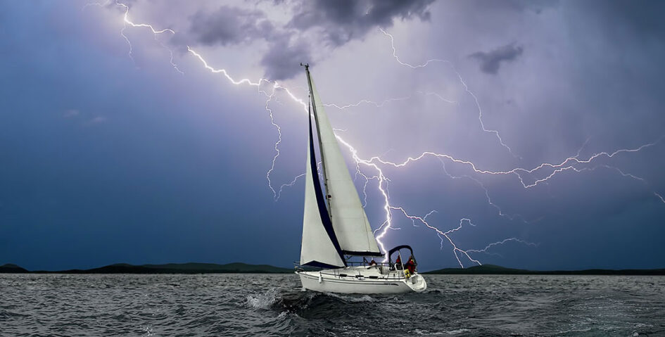 sailboat in lightning storm